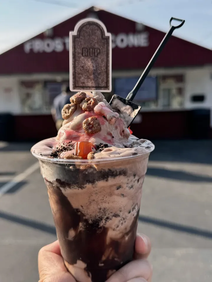 Graveyard Parfait with a tombstone pick and a tiny shovel spoon