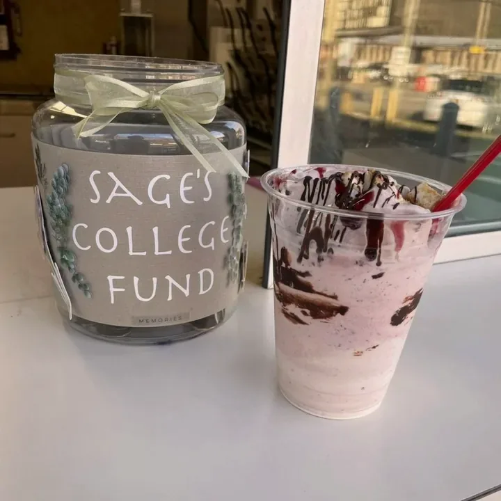 A shake on the counter next to a tip jar labeled Sage's College Fund